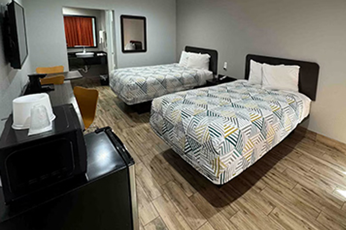 Extended-stay room with two beds