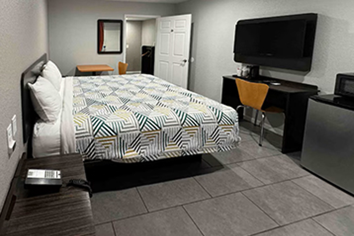 Extended-stay one-bed guest room
